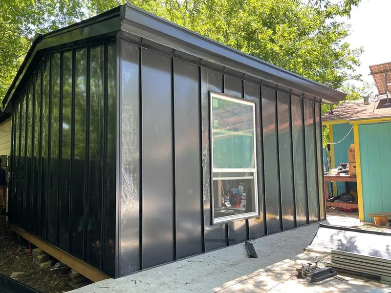 Black standing seam metal wall panels for Metal Roof Installation in La Crescent