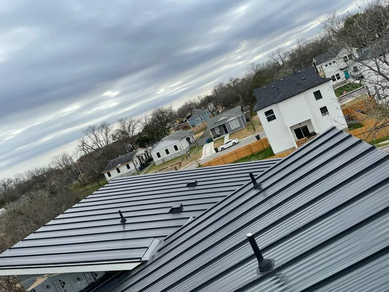 Standing seam metal roof panels with vents for Skylight Repair in La Crescent